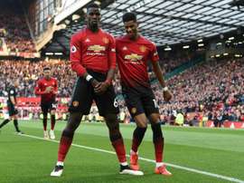 Manchester United could have Paul Pogba (left) and Marcus Rashford (right) fit for when the Premier League returns