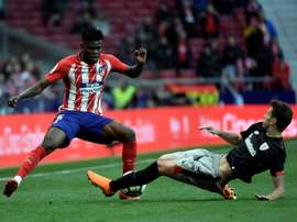 En Ghana creen que seguir en el Atlético es una opción interesante. AFP