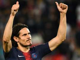 Cavani tiene pie y medio en el Atleti. AFP