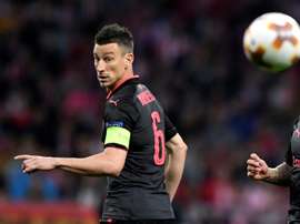Koscielny appeared to suffer a fresh setback against Portsmouth. AFP