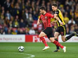 Shane Long playing for Southampton against Watford. AFP