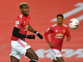 Evra prend la défense de Pogba. AFP