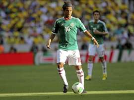 El lance Giovani-'Piojo' que no concuerda con lo ocurrido en el Mundial de Brasil. EFE