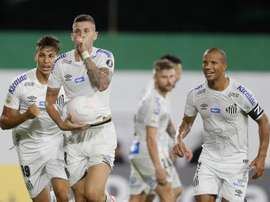 Jobson comemora gol pela Copa Libertadores contra o Defensa y Justicia. EFE/ Juan Ignacio Roncoroni