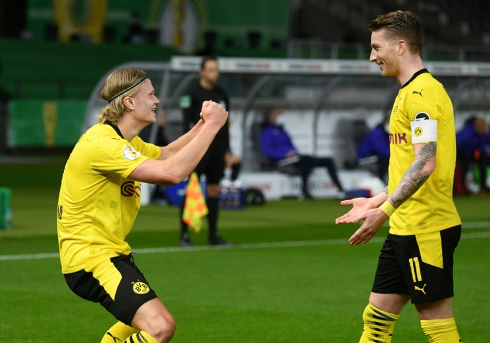 Erling Haaland (L) scored twice as Dortmund beat Leipzig 4-1. AFP