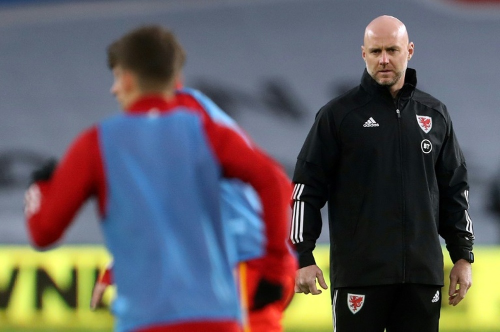 Rob Page (R) says he will make the decisions regarding selection, not Giggs. AFP