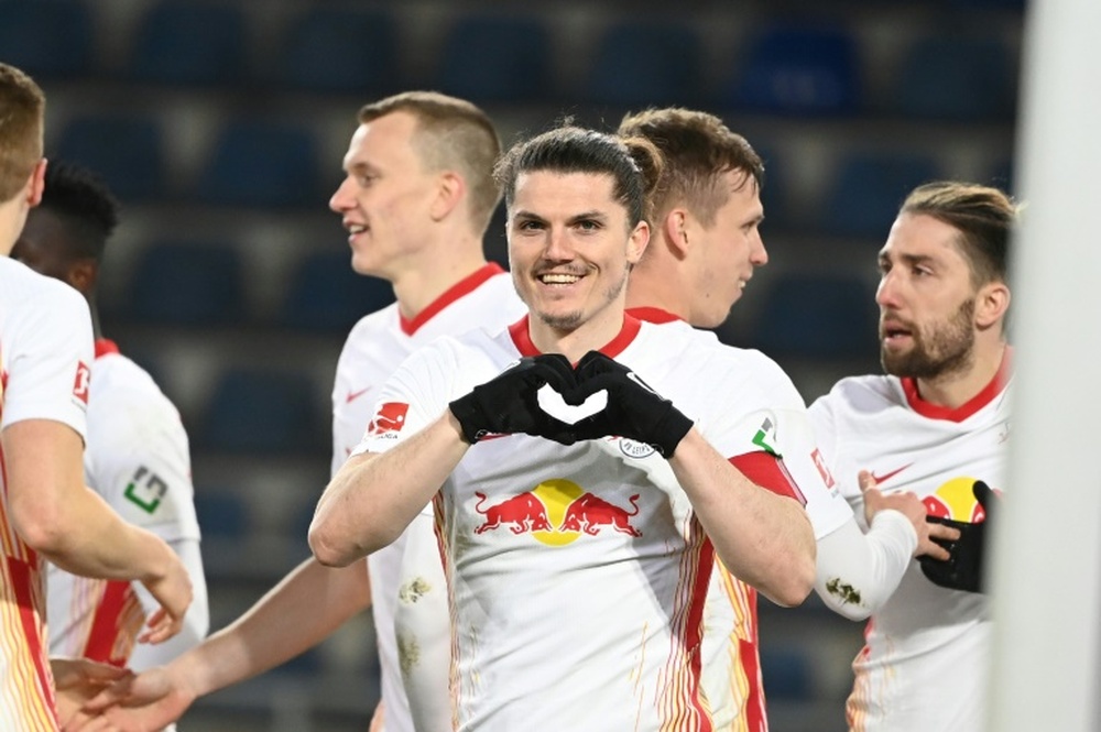 Leipzig gagne et revient à un point du Bayern. AFP